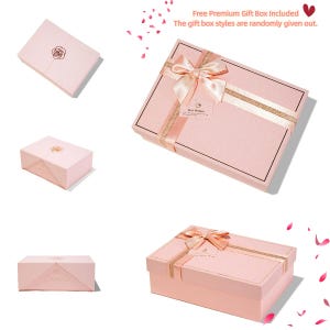 Peut inclure: Une bo&icirc;te cadeau rectangulaire rose clair avec une surface textur&eacute;e, un n&oelig;ud en ruban satin&eacute; d&eacute;coratif et une bordure dor&eacute;e. La bo&icirc;te comprend une petite &eacute;tiquette avec le texte Best Wishes et est pr&eacute;sent&eacute;e sous plusieurs angles diff&eacute;rents.