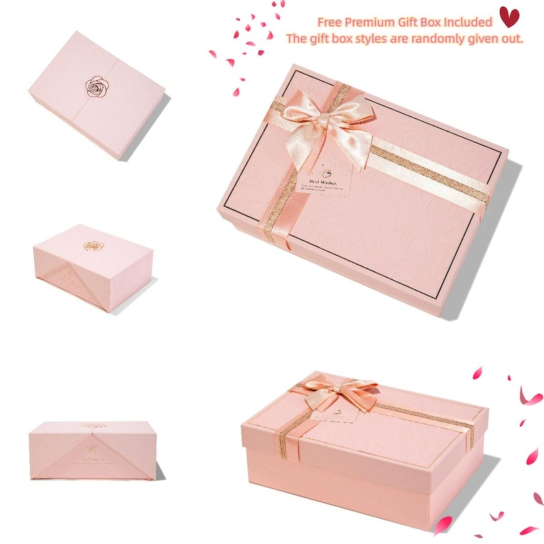 Peut inclure: Une bo&icirc;te cadeau rectangulaire rose clair avec une surface textur&eacute;e, un n&oelig;ud en ruban satin&eacute; d&eacute;coratif et une bordure dor&eacute;e. La bo&icirc;te comprend une petite &eacute;tiquette avec le texte Best Wishes et est pr&eacute;sent&eacute;e sous plusieurs angles diff&eacute;rents.