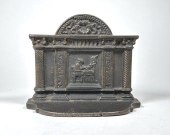 Cast Iron Bookend with a Woman Seated in Neoclassical Architecture - Single