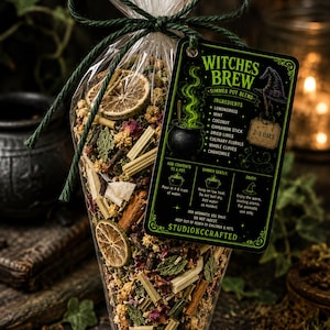 May include: A clear plastic cone-shaped bag filled with a dried simmer pot blend containing lemongrass, mint, coconut, cinnamon sticks, dried lime slices, culinary florals, cloves, and chamomile, tied with a dark green string and a black tag.