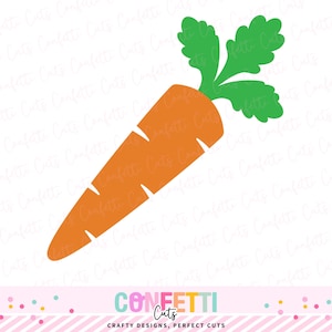 May include: A bright orange carrot with green leafy tops. The carrot has several diagonal cut lines. The bottom of the image has the text "Confetti Cuts" and "Crafty Designs, Perfect Cuts".