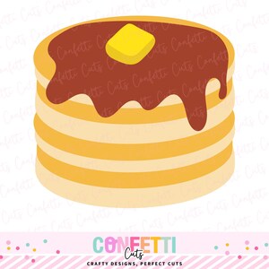 以下が含まれることがあります： シロップとバターの塊が乗ったパンケーキの山。パンケーキは黄金色で、濃い茶色のシロップが横に垂れています。黄色いバターの正方形が上にあります。画像には「Confetti Cuts」と「Crafty Designs, Perfect Cuts」という文字が入っています。