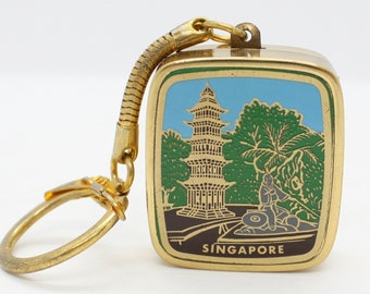 Vintage 'Sankyo' key ring keychain music box, Singapore souvenir, plays 'Love story'