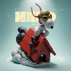 May include: A Snoopy figurine in a pilot's helmet and goggles sits atop a red doghouse with black accents. The figurine is white with a black nose and ears. The doghouse rests on a cloud-like base. The words "HERO CREATION" are visible.