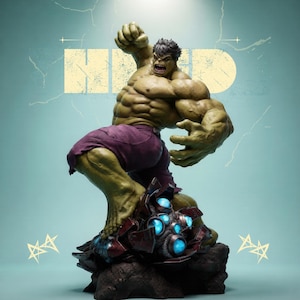 May include: A detailed Hulk statue in a dynamic pose, with green skin, purple shorts, and a fierce expression. The statue is mounted on a detailed base with blue glowing accents. The background features the word "Hulk" in a distressed font.