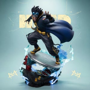 May include: A dynamic figurine of a superhero in a striking pose. The figure, clad in a dark blue and yellow costume, is captured mid-action, with a flowing cape. The base features a stylized street scene with a fire hydrant and electric effects.
