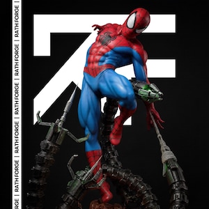 May include: A detailed statue of Spider-Man in a dynamic pose, wearing his classic red and blue suit. The figure is posed on top of mechanical tentacles, with the text "RATH FORGE" visible in the background. The statue has a detailed design.