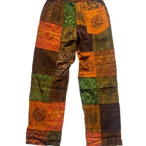 Pantaloni unisex in stile hippie con patchwork a funghi di colori misti