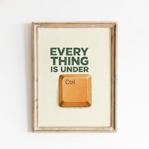 May include: Framed print featuring the text "EVERYTHING IS UNDER" in green above an orange "Ctrl" key illustration. The artwork has a vintage style, with a light beige background and a wooden frame.