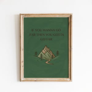 May include: Framed art print featuring a green background with the text "IF YOU WANNA GO FAR THEN YOU GOTTA GO FAR" in brown. The artwork includes a mountain illustration with trees and a winding path.