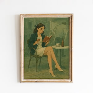 May include: A framed art print depicts a woman reading a book while seated at a cafe table. She holds a glass of wine. A bottle and a cup of coffee sit on the table. The artwork has a vintage aesthetic with muted green and brown tones.