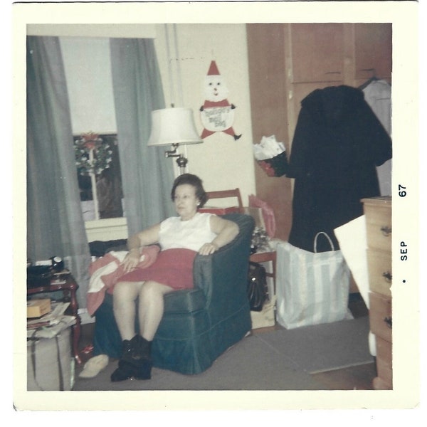 Black Friday Blues Vintage Photo Tired Out From Christmas Shopping Woman Doesn’t Have Enough Energy To Take Off Her Boots Color Snapshot