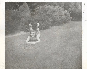 Silly Girl Poses With Legs In The Air Small Vintage Photo Young Woman On The Lawn Black & White Snapshot