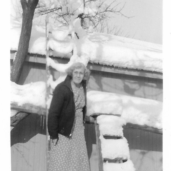 Mom’s At It Again Older Woman Climbing Ladder In The Snow Vintage Photo Winter Snowstorm Black & White Snapshot