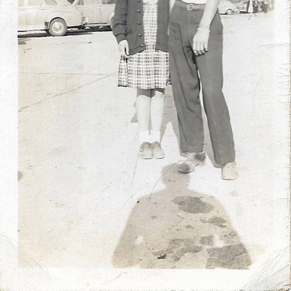 Motor Oil Stains On Parking Lot Appear In Photographer Shadow Vintage Photo Cute Teen Couple Smile For Camera Asphalt Car Maintenance