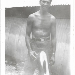 Vintage Photo Camera Malfunction Creates Odd Light On Shirtless Man WWII Soldier Black & White Snapshot Anomaly