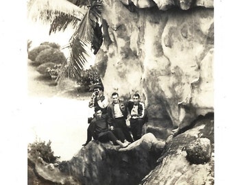 Dueling Cameras Vintage Photo Young Man With Camera & Friends Wearing Letter Jackets Posed In A Rock Formation Unusual Snapshot