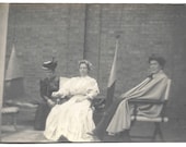Corset Tiny Waist Woman Sitting With Cape Wearing Friend Woman Wearing Funny Hat Vintage Photo Victorian Era Fashion
