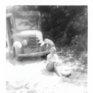 Brown Army Pants Vintage Photo Young Woman With Antique Truck Abstract Black & White Snapshot Soft Blur Photography