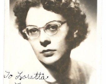 Vintage 1940s Studio Portrait: Woman with Eyeglasses, Sepia Photo