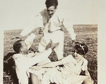 1920s Antique Photograph: Friends Having Fun, Flapper Woman with Hair Bow