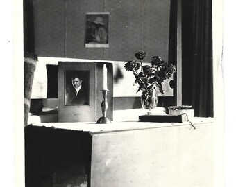 Antique Photo Still Life With Candlestick, Bouquet Of Flowers and Photograph Of Young Man Abstract Empty Room