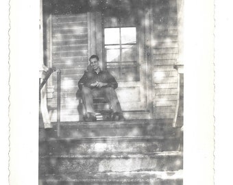 Tiny Bubbles Vintage Photo Developing Mistake Film Damage Strange Unusual Black & White Snapshot Man Sitting On Porch