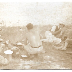 Shirtless Cook Making Breakfast At The Campsite Young Men In The Outdoors Vintage Photograph Sepia Snapshot