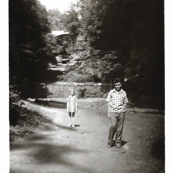 Brother & Sister Vintage Photo Interesting Composition Perspective 1960’s Black and White Photography Little Girl Teen Boy