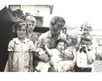 Vintage Photo Large Family Seven Children Handsome Young Man Holds The Active Babies 1940’s Black & White Snapshot