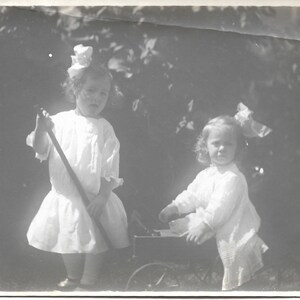 Adorable Little Girls Victorian Big Hair Bows White Cotton Dresses Original Vintage Photo Sisters Playing With Wooden Cart