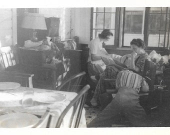 Young Woman Leaning On Chair And Mother & Daughter Reading Newspaper Candid Vintage Photo Table Set For Dinner