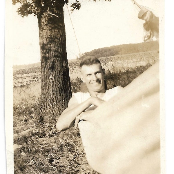 Smiling Man Relaxing In Hammock Vintage Snapshot Afternoon Nap Summer Vacation 1930’s Sepia Photo