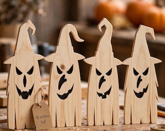 May include: Four light-colored wooden ghost figures wearing pointed hats with cut-out facial features. Each figure has a jagged bottom edge and a brown paper tag attached to the first ghost that reads 18 inches tall. The figures stand upright.