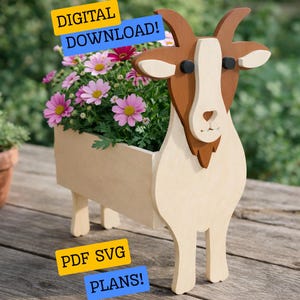 May include: A wooden goat-shaped planter with a light brown and white finish, holding pink and purple flowers. The planter has a rectangular box for the flowers and the text "DIGITAL DOWNLOAD!" and "PDF SVG PLANS!" on the image.