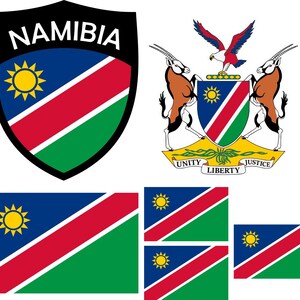 May include: A collection of Namibian national symbols. Includes the Namibian flag, a shield with the word "NAMIBIA", and the coat of arms featuring oryxes, an eagle, and the words "Unity, Liberty, Justice". The flag has blue, red, green, and yellow elements.