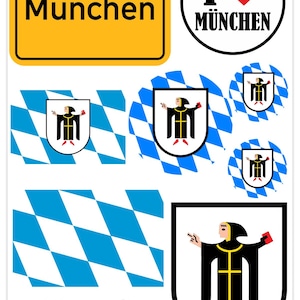 May include: A collection of stickers and decals featuring Munich-themed designs. Includes a yellow sign with "München" text, an "I heart München" emblem, Bavarian flags, and a coat of arms with a figure in black robes.