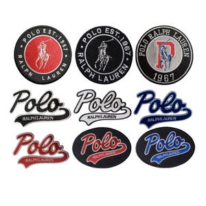 May include: A collection of nine embroidered patches featuring the Polo Ralph Lauren logo. The set includes circular patches with the polo player icon and text, as well as script-style Polo Ralph Lauren logos in various colors like red, black, white, and blue.