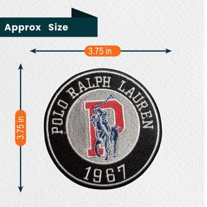 May include: A circular embroidered patch featuring the text Polo Ralph Lauren and 1967. The center displays a red letter P with a blue and white polo player graphic. The patch measures approximately 3.75 inches in width and 3.75 inches in height.