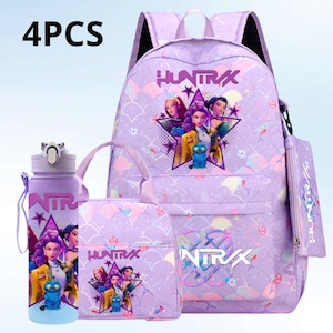 May include: A four-piece purple school set including a backpack, lunch bag, pencil case, and water bottle. Each item is decorated with a star graphic and the text "HUNTRX" and "NTRX". The set has a mermaid scale pattern and a cartoon graphic.