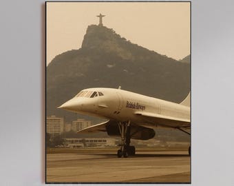 May include: Sepia-toned print of a British Airways Concorde jet on a runway, with the Christ the Redeemer statue atop a mountain in the background. Buildings and a cloudy sky are also visible.
