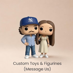 May include: Two stylised vinyl figurines standing side by side. The left figure wears a blue baseball cap with a white logo, a light blue button-down shirt, blue jeans, and white trainers. The right figure has long brown hair and wears a cream dress.