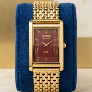 Vintage Seiko Kleideruhr - Gold Rechteckiges Gehäuse, kastanienbraunes Ziffernblatt, überholt