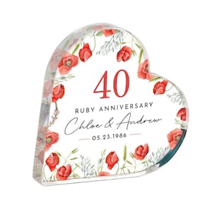 Könnte beinhalten: Ein Set aus drei Keramikbechern mit gesprenkelter, matter Oberfläche. Die Becher sind in Creme-, Hellgrau- und Dunkelgrautönen gehalten. Jeder Becher hat ein schlichtes, minimalistisches Design, perfekt für Kaffee oder Tee.