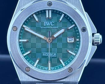 Reloj de pulsera IWC Schaffhausen INGENIEUR vintage con movimiento automático, esfera verde, caja y brazalete de acero inoxidable y fecha funcional para hombre.