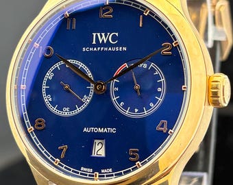 Vintage IWC Schaffhausen 7 Days Power Reserve Automatic Blue Dial, Black Leather Strap, Rose Gold Case Transparent Back Sub-Sec/Date Watch