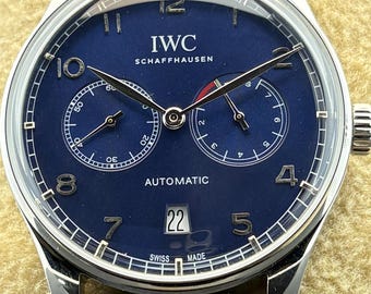Vintage IWC Schaffhausen 7 Days Power Reserve Automatic Blue Dial, Blue Leather Strap, Silver Case Transparent Back Sub-Sec/Date Wristwatch