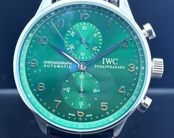 Reloj de pulsera IWC PORTUGIESER Cronógrafo Automático Vintage con esfera verde, correa de cuero negra, caja plateada, fondo transparente, acero inoxidable, para hombre.
