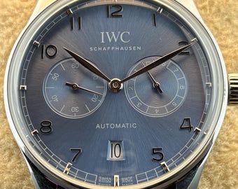 Vintage IWC PORTUGIESER 7 Days Power Reserve Automatic Blue Dial, Blue Rubber Strap, Silver Case Transparent Back, Sub-Sec/Date Wristwatch