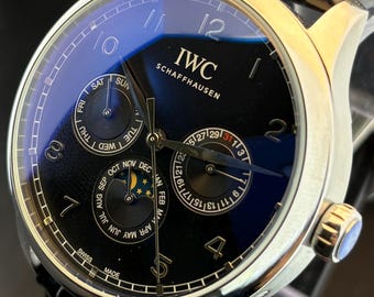 Vintage IWC Schaffhausen Moon Phase Automatic Black Dial, Black Leather Strap Silver Case Date/Day/Month Working Transparent Back Wristwatch